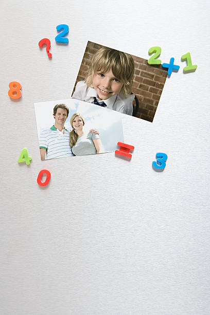 Photos on a fridge  magnet photos stock pictures, royalty-free photos & images