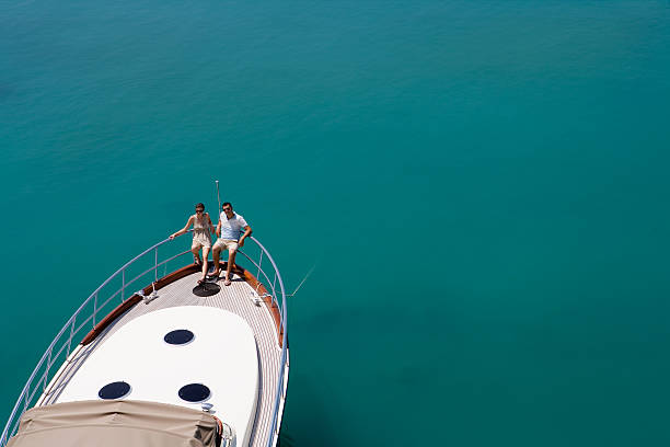 couple on a yacht in the sea - yacht nautical vessel luxury sea стоковые фото и изображения