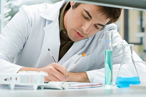 Science Writing Photos 13,000+ Scientist Writing Stock Photos, Pictures & Royalty-Free Images ...
