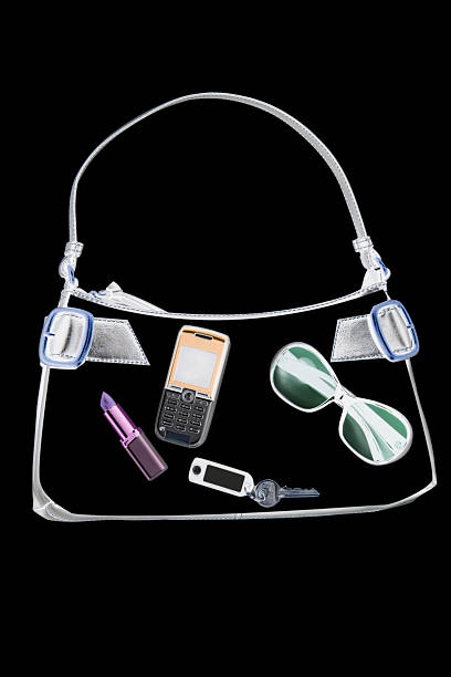 x ray of objects in handbag - cosmetic purse 뉴스 사진 이미지