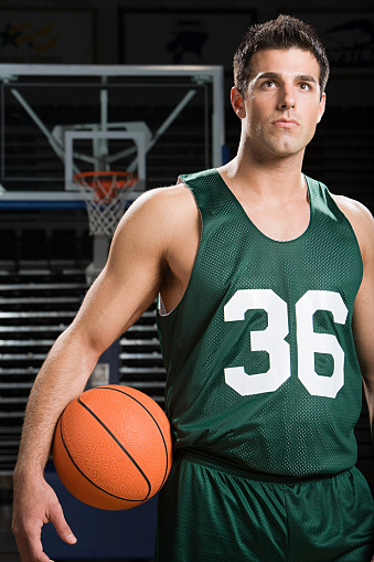 one caucasian man basketball player isolated in silhouette white background