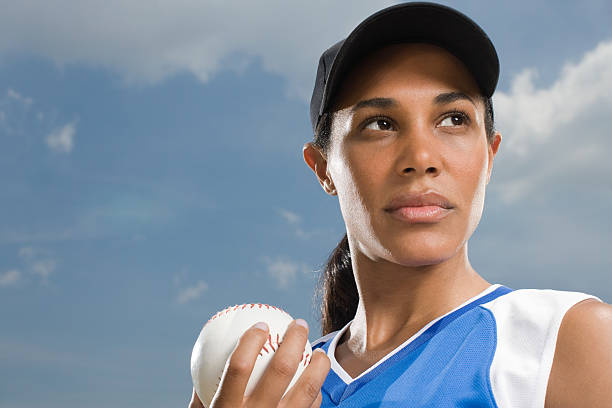 woman holding baseball - sports uniform hat one person american culture 뉴스 사진 이미지