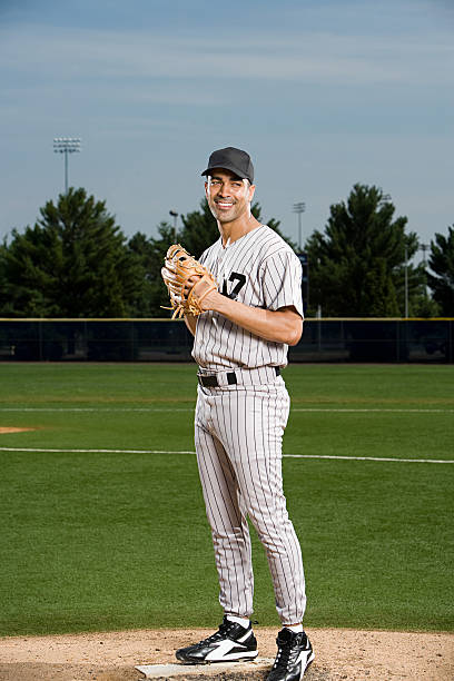 baseball player-pitcher - sports uniform hat one person american culture 뉴스 사진 이미지