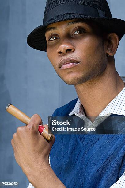 Young Man Having A Cigar Stock Photo - Download Image Now - 20-29 Years, 30-39 Years, Adult