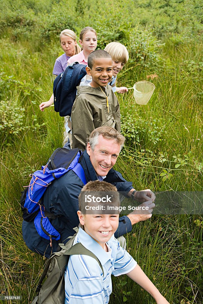 Teacher and pupils at nature reserve  Nature Stock Photo