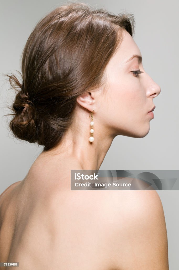 Profile of a young woman  Back Stock Photo