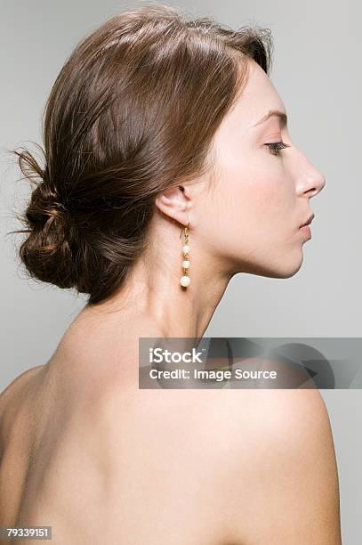 Profile Of A Young Woman Stock Photo - Download Image Now - Back, One Woman Only, Profile View