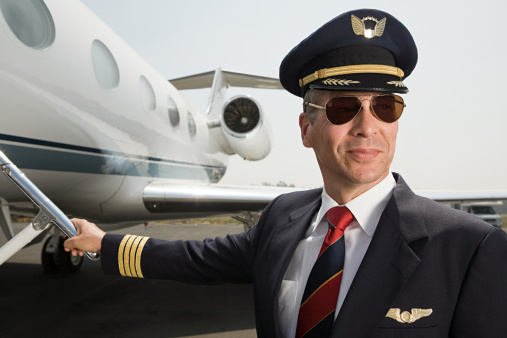 Wealthy passengers using private luxury jet to travel to destination