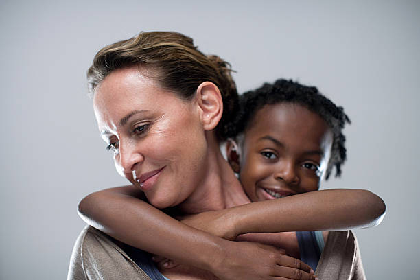 Mother and daughter  adoption photos stock pictures, royalty-free photos & images