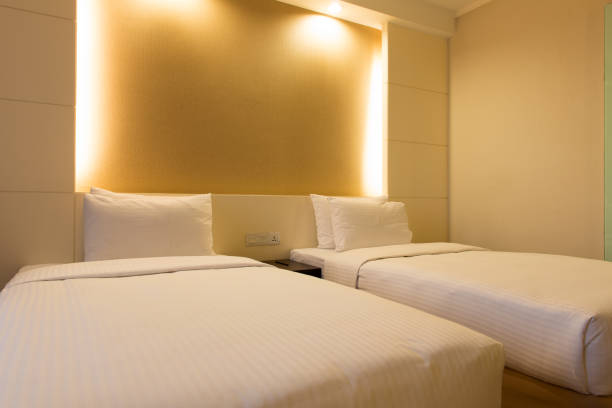 istock Twin bed in hotel bedroom 800008662