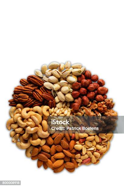 Assorted Nuts In The Form Of A Circle On A White Background Stock Photo - Download Image Now