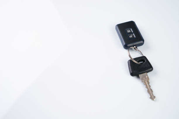 istock Car key and alarm system charm isolated on a white background with copy space 800018270