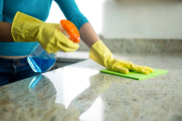 istock Pretty woman doing her house chores 800020786