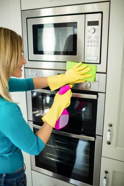 istock Pretty woman doing her house chores 800034936