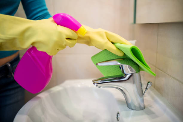 istock Pretty woman doing her house chores 800050248