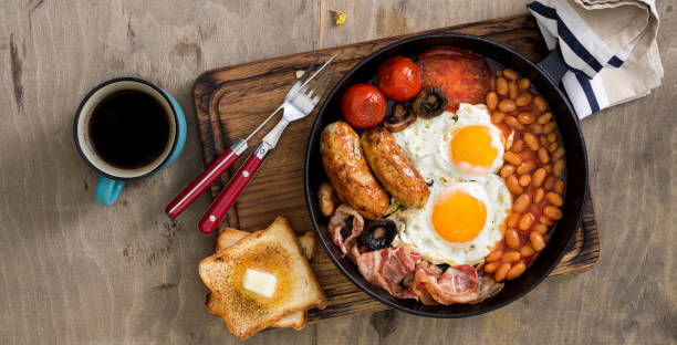 istock English breakfast on wooden table with copy space 800079100
