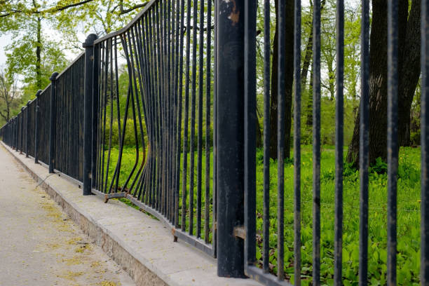istock The bent fence after the accident. 800119510