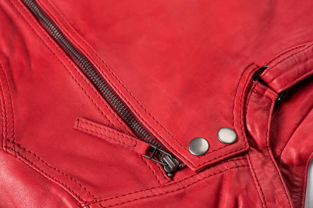 istock Red  leather jacket. Leather jacket macro details. Jacket zippers and pockets 800137370