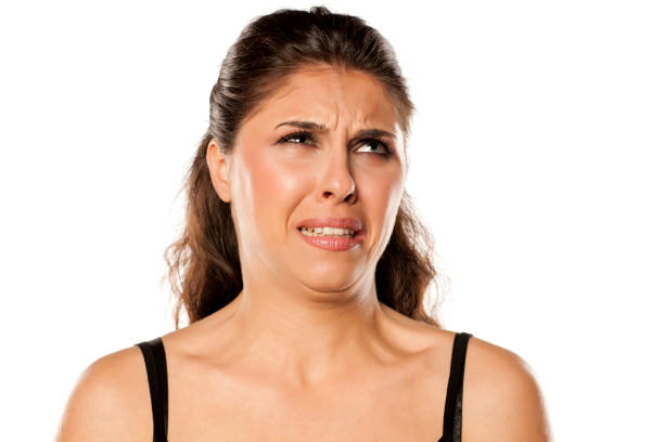 istock The young brunette was disgusted of something 800215458
