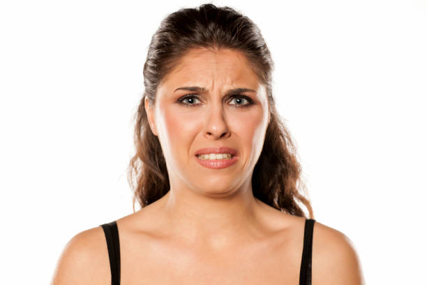 istock The young brunette was disgusted of something 800215468