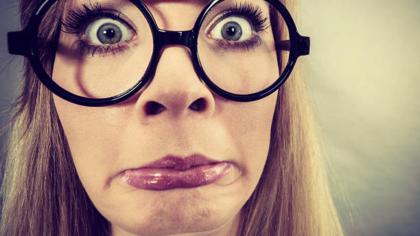istock Closeup woman shocked face with eyeglasses 800286554