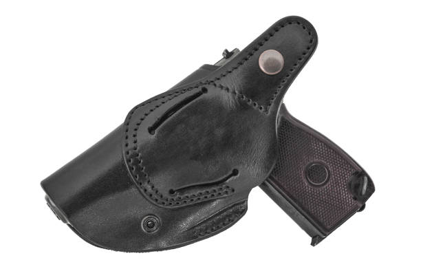 istock Molded leather holster with handgun. Isolated 800289954