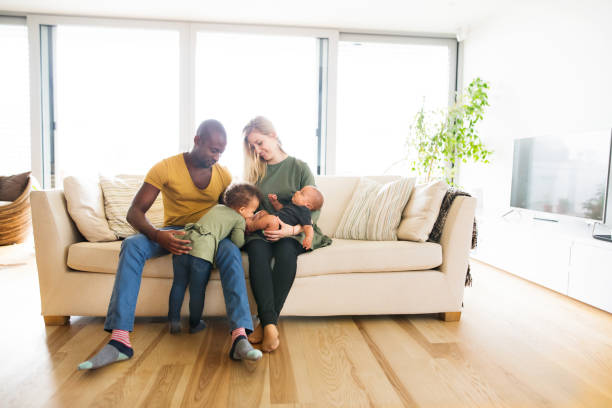 young interracial family with little children at home. - african ethnicity brother ethnic little boys imagens e fotografias de stock