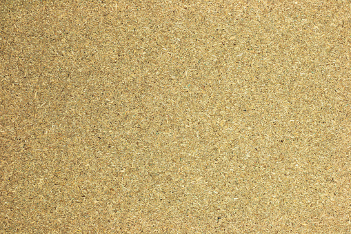 Macro image showing the random fibre pattern of a large section of blank cardboard.