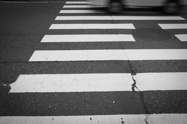 istock Pedestrian Crossing and a car 800296358
