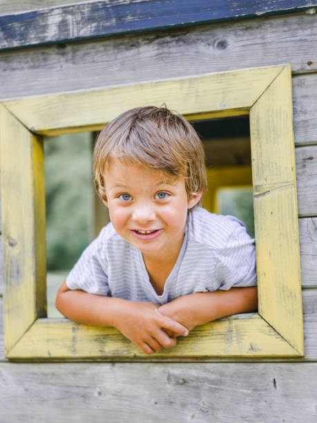 istock Child, boy playing at a children‘s playground 800306558