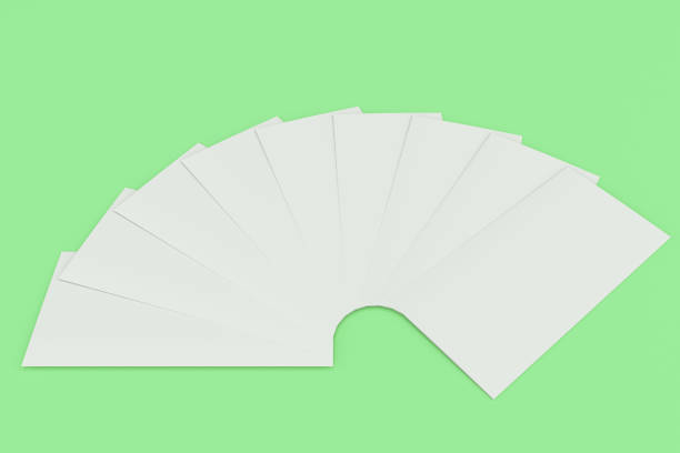 istock Blank white three fold brochure mockup on green background 800316212