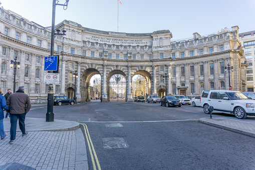 London, UK - December 04, 2016: Admiralty Arch in London. People and traffic are pictured