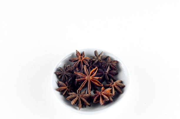 istock Anise spice in bowl over white background 800341750