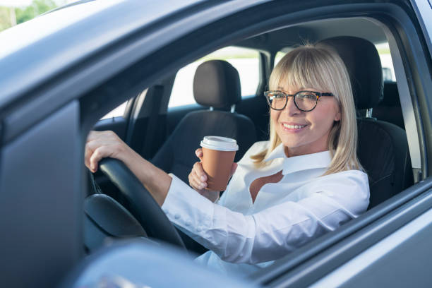 istock Mature businesswoman at car 800344814