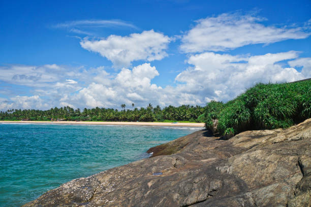istock Indian Ocean surface summer wave background. Exotic water landscape with clouds on horizon. tropical water paradise. Maldives nature relax. Travel island resort. Untouched beach in Sri Lanka 800345066