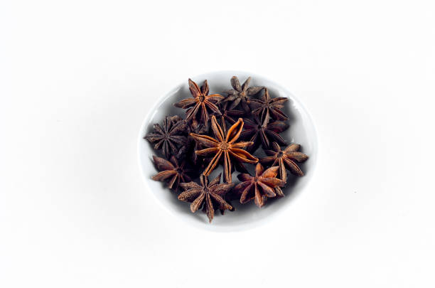 istock Anise spice in bowl over white background 800348462