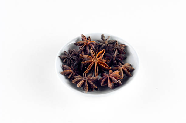 istock Anise spice in bowl over white background 800349304