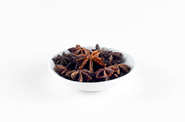 istock Anise spice in bowl over white background 800349498