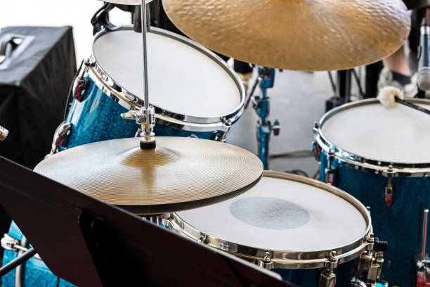 istock musical equipment on stage. drum set ready for street performance. 800355776