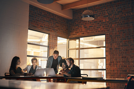 Shot of a group of designers having a brainstorming session in the boardroom