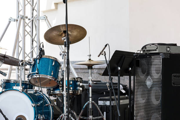 istock music installation with drums standing outdoors before concert 800364940