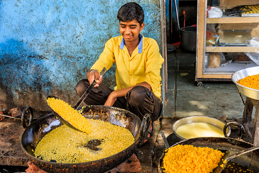Indian Street Food seller selling food at Roadside food stall