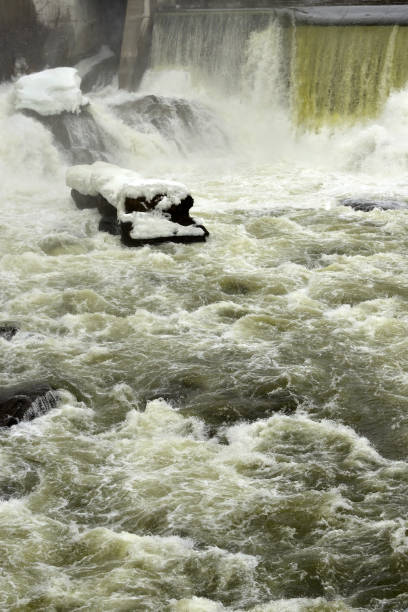 Icy Rock in Turbulent Waters at Sherbrooke Quebec Hydro (downtown Sherbrooke) Quebec, Canada
