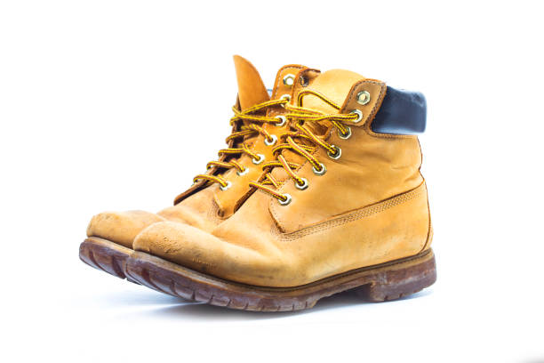 istock Pair of old yellow working bootsNostalgic 800375800