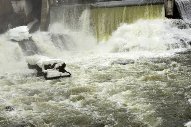 Icy Rock in Turbulent Waters at Sherbrooke Quebec Hydro (downtown Sherbrooke) Quebec, Canada