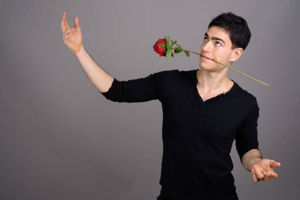 istock Studio shot of young handsome man against gray background 800387348