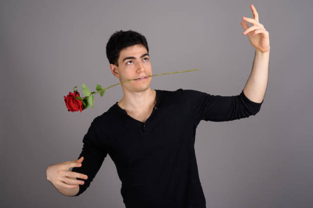 istock Studio shot of young handsome man against gray background 800387404