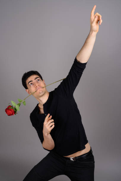 istock Studio shot of young handsome man against gray background 800387438