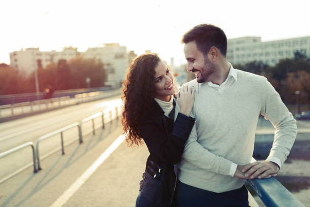 istock Couple cuddling while enjoying time spent together 800389700