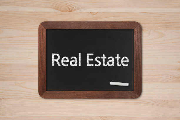 istock Real Estate - Business Chalkboard Background 800390828